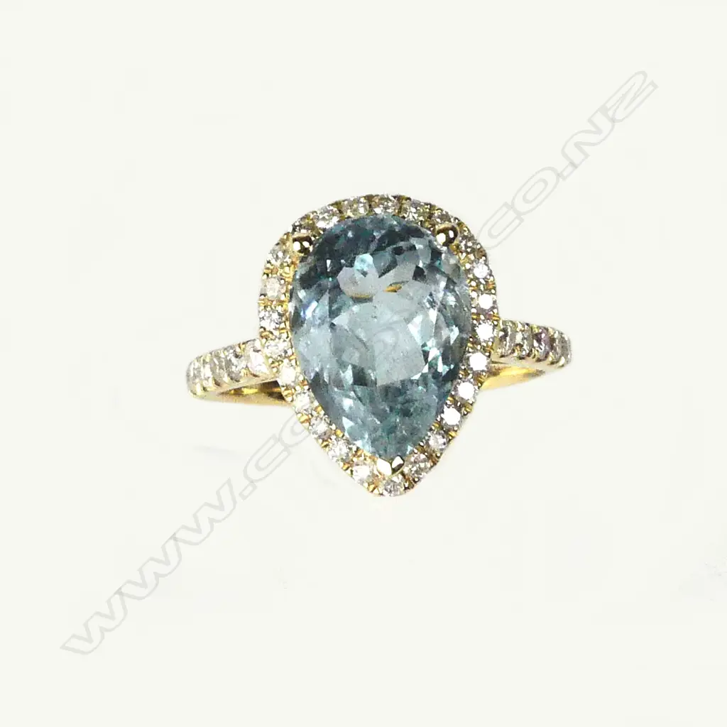 A 14ct gold aquamarine and diamond ring Image 1++