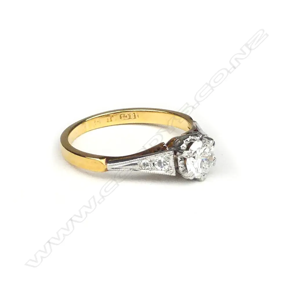 A vintage 18ct gold and diamond solitaire ring Image 1++