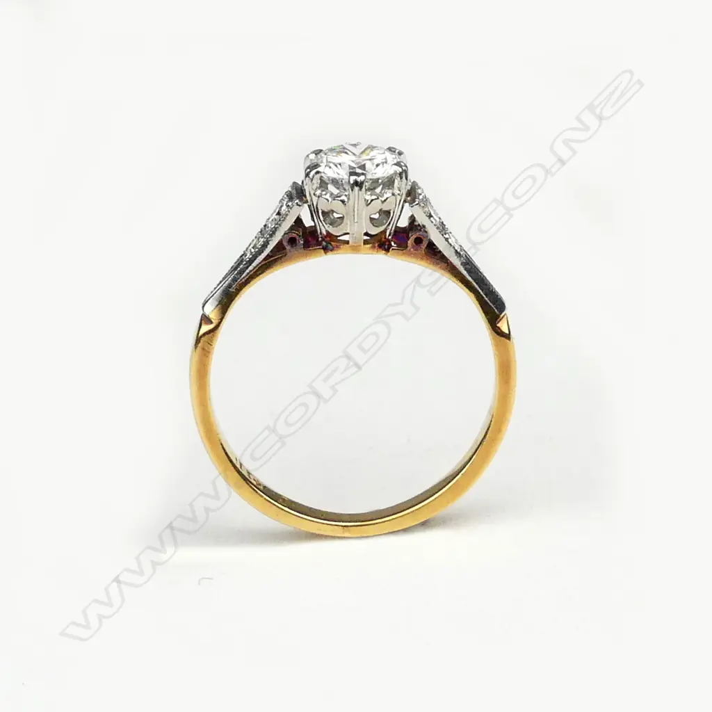A vintage 18ct gold and diamond solitaire ring Image 1++