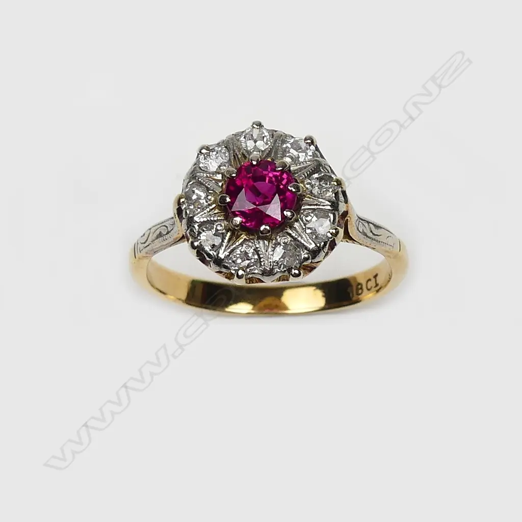 An estate 18ct gold ruby and diamond cluster ring Image 1++