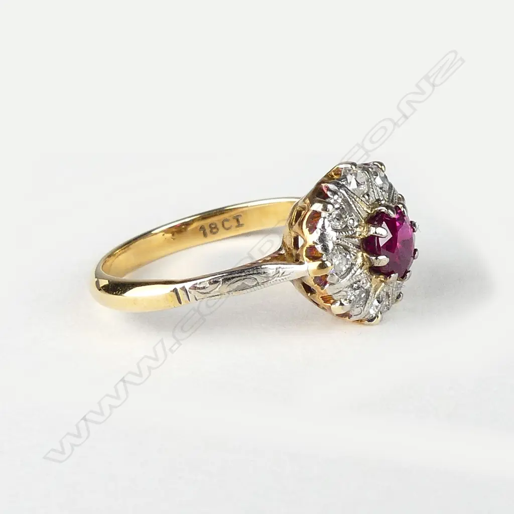 An estate 18ct gold ruby and diamond cluster ring Image 1++
