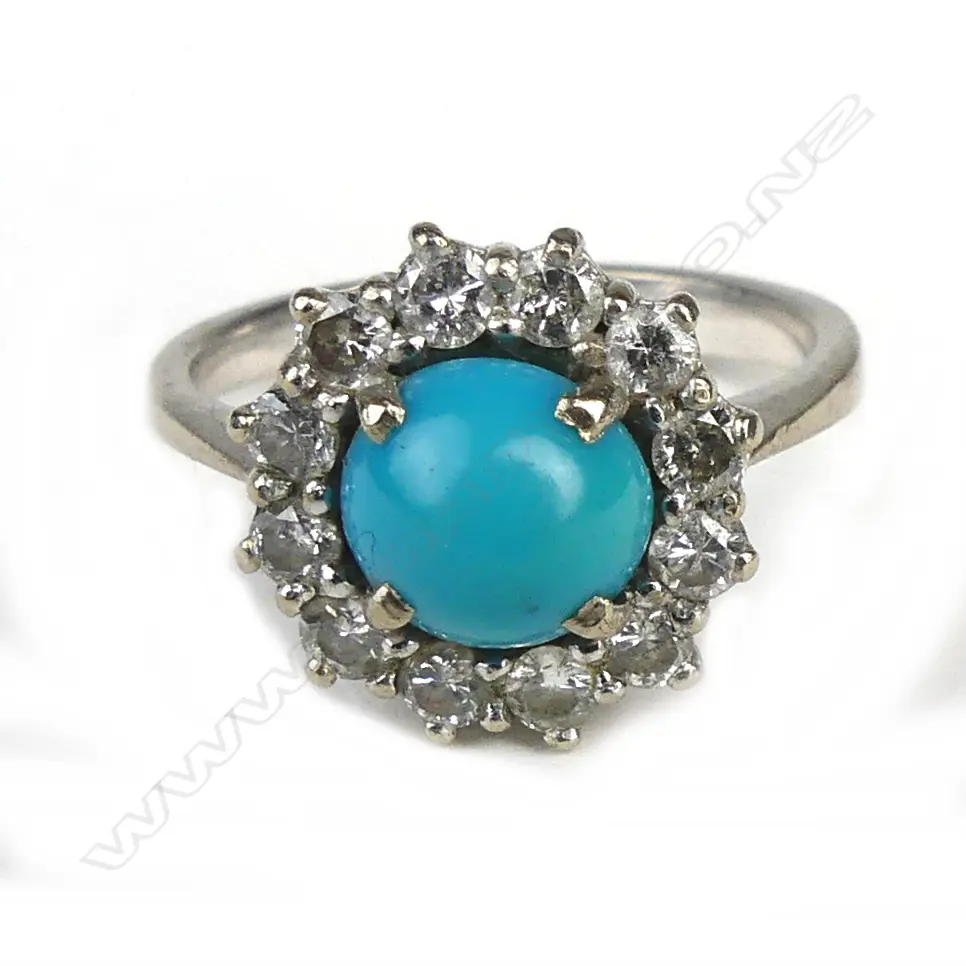 A 14ct white gold diamond and turquoise ring Image 1++