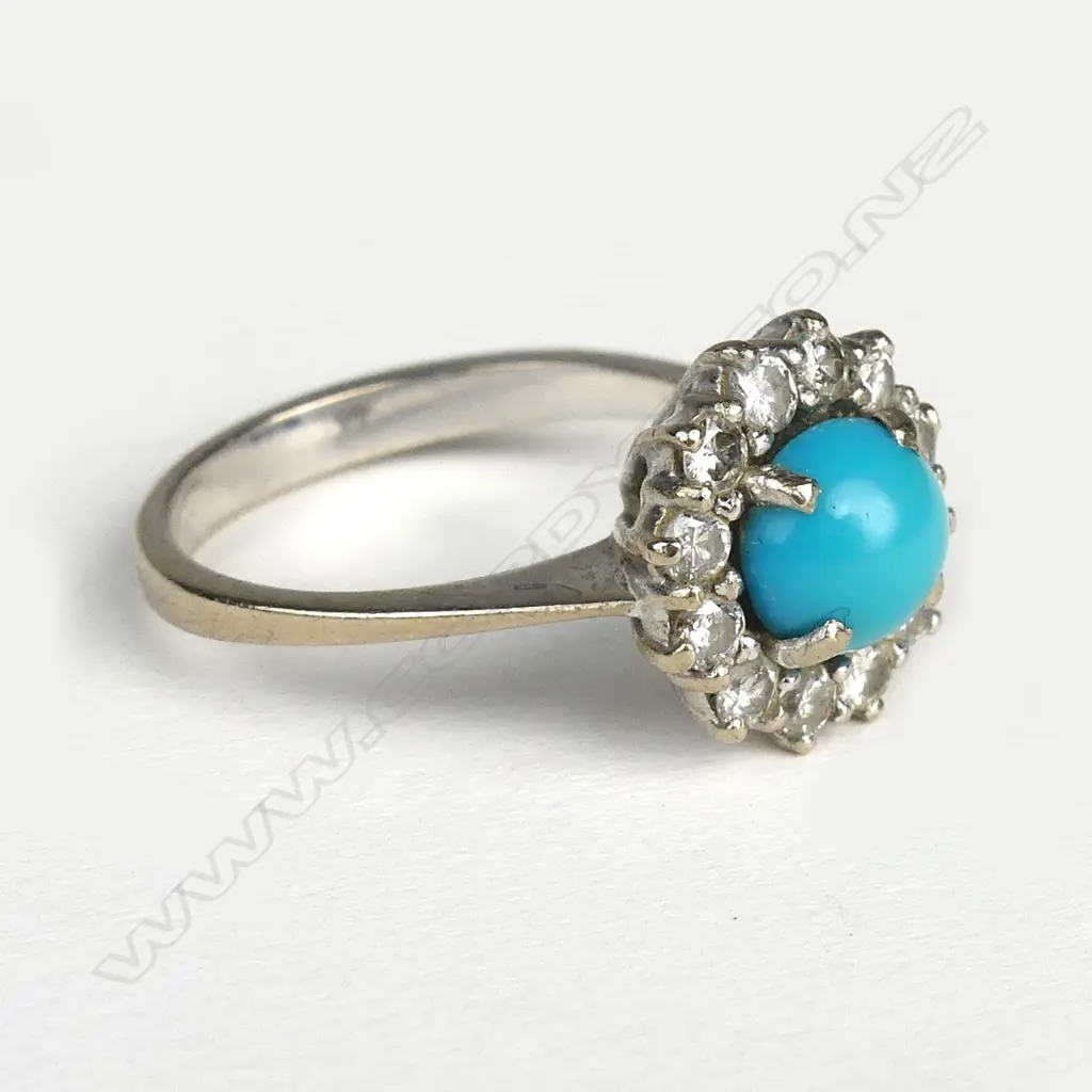 A 14ct white gold diamond and turquoise ring Image 1++