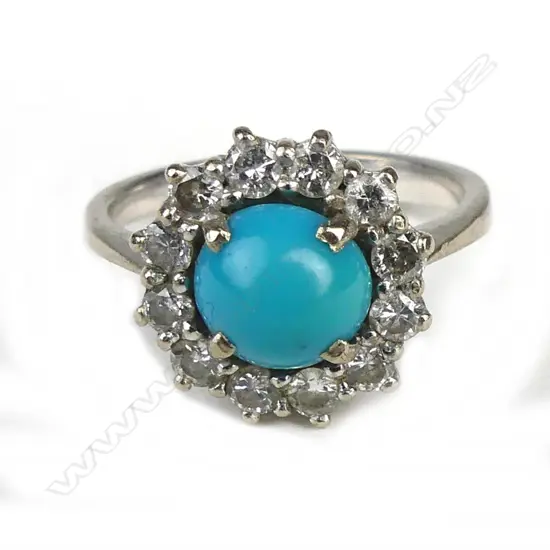 A 14ct white gold diamond and turquoise ring