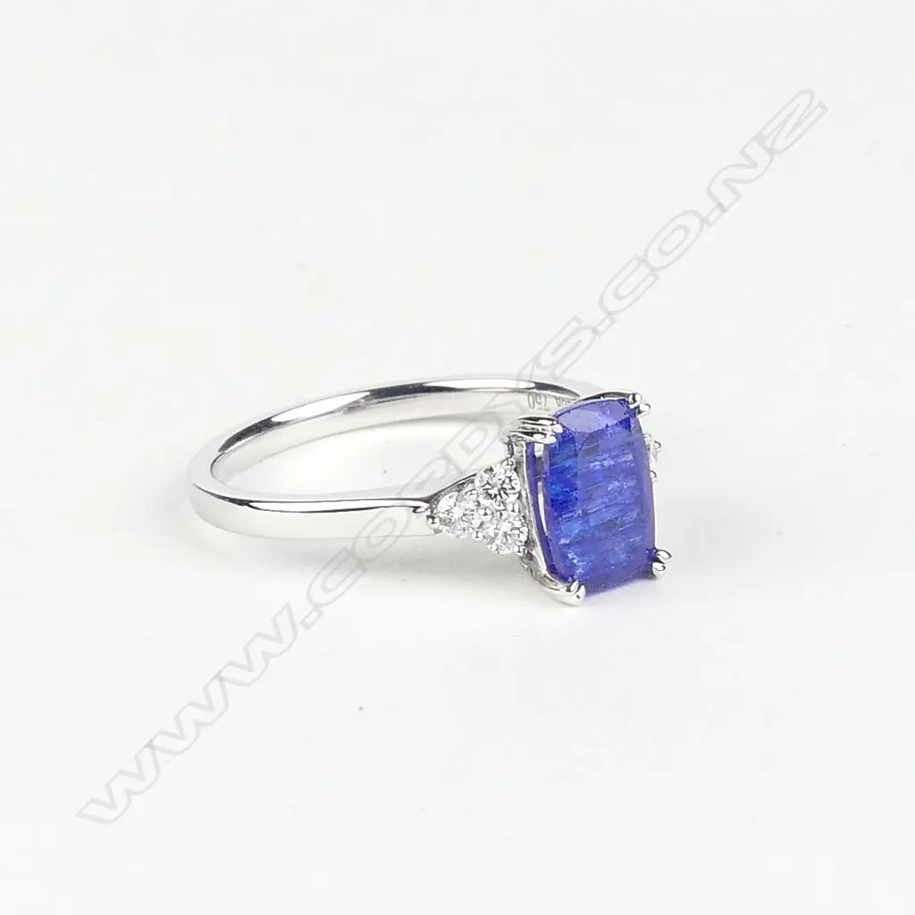 An 18ct white gold tanzanite and diamond ring Image 1++