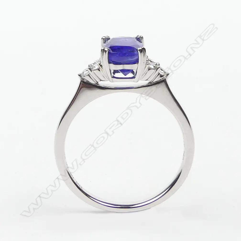An 18ct white gold tanzanite and diamond ring Image 1++
