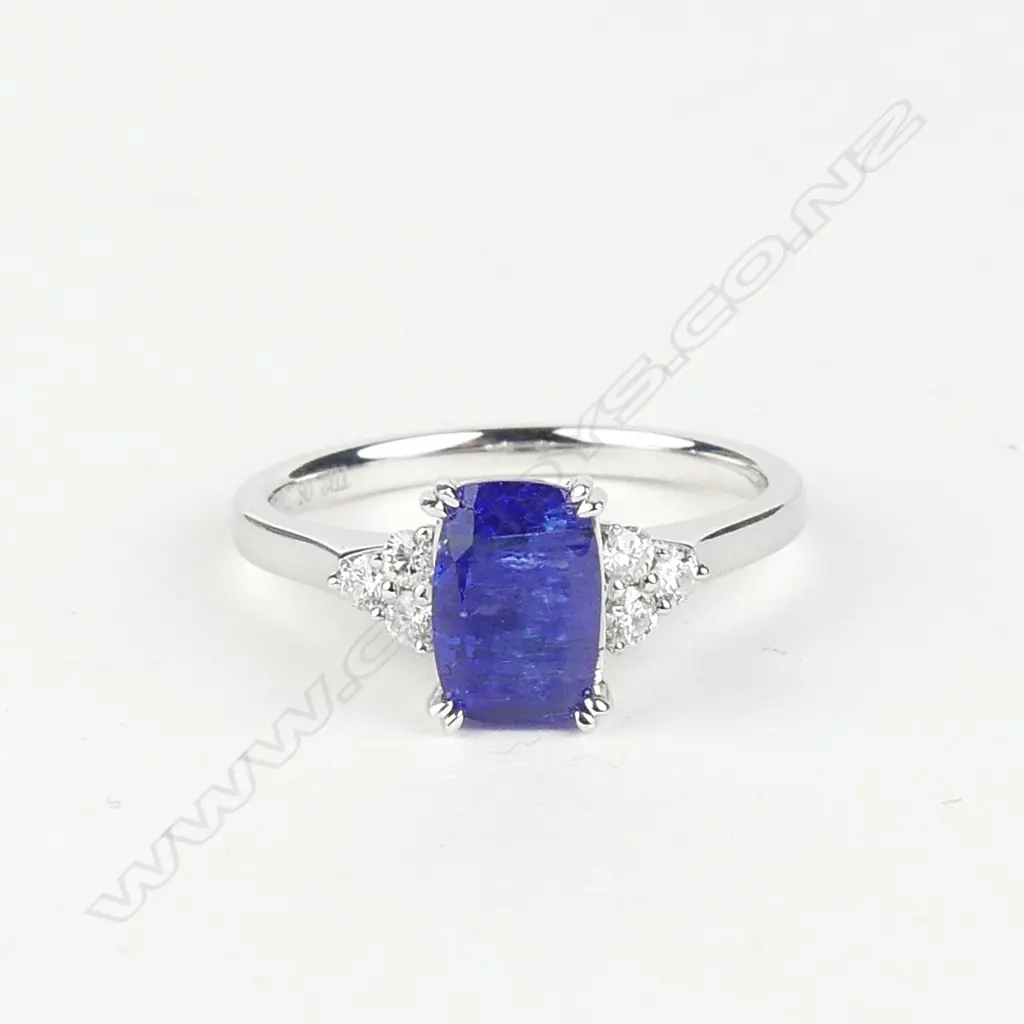 An 18ct white gold tanzanite and diamond ring Image 1++