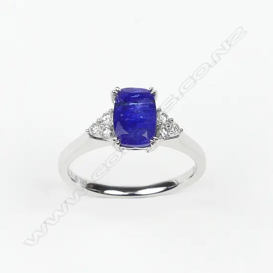 An 18ct white gold tanzanite and diamond ring