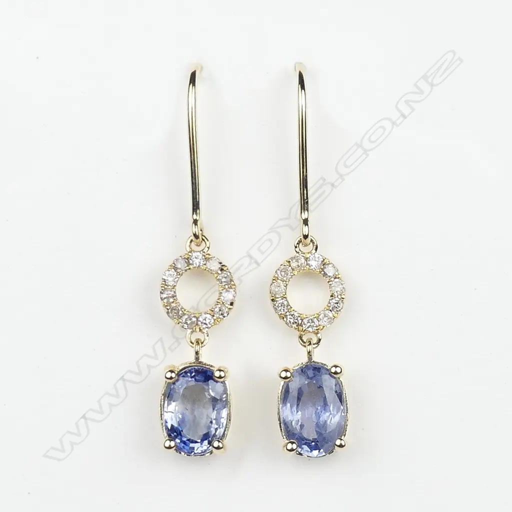 A pair of 14ct gold sapphire and diamond earrings Image 1++