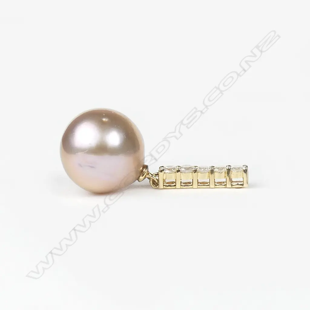 A pair of 14ct gold diamond and pearl drop earrings Image 1++