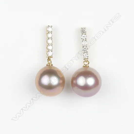 A pair of 14ct gold diamond and pearl drop earrings