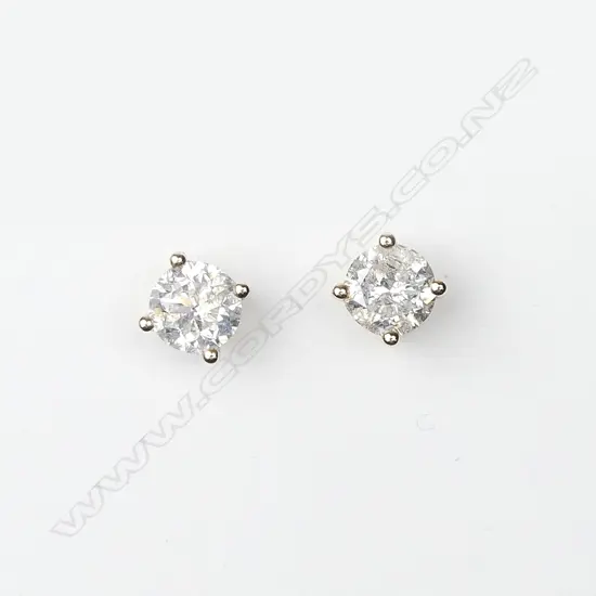 A pair of 14ct gold and diamond stud earrings