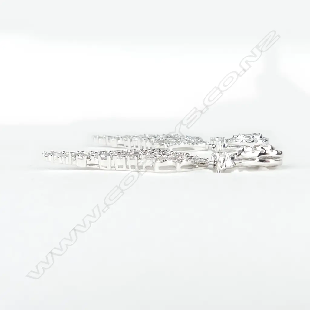 A pair of 18ct. white gold multi-diamond set leaf form drop earrings Image 1++