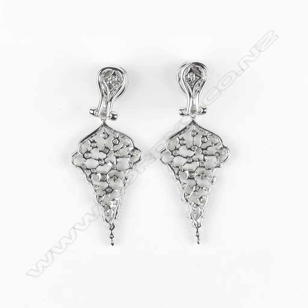 A pair of 18ct. white gold multi-diamond set leaf form drop earrings Image 1++