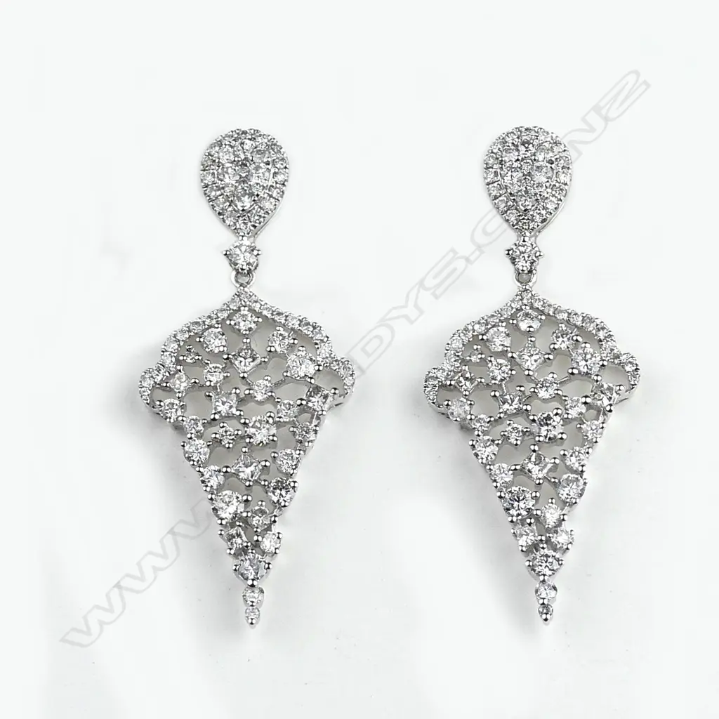 A pair of 18ct. white gold multi-diamond set leaf form drop earrings Image 1++