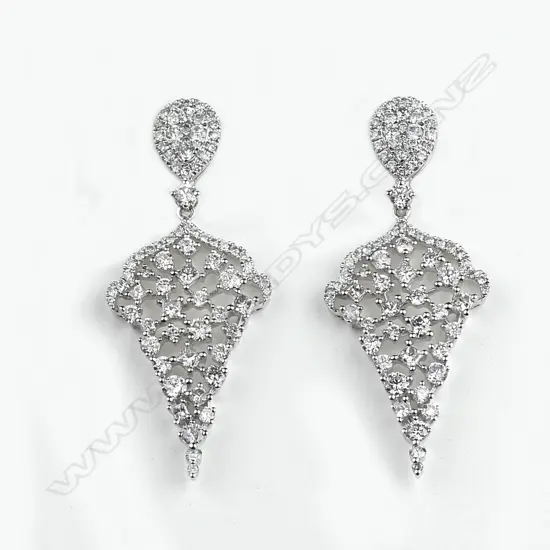 A pair of 18ct. white gold multi-diamond set leaf form drop earrings
