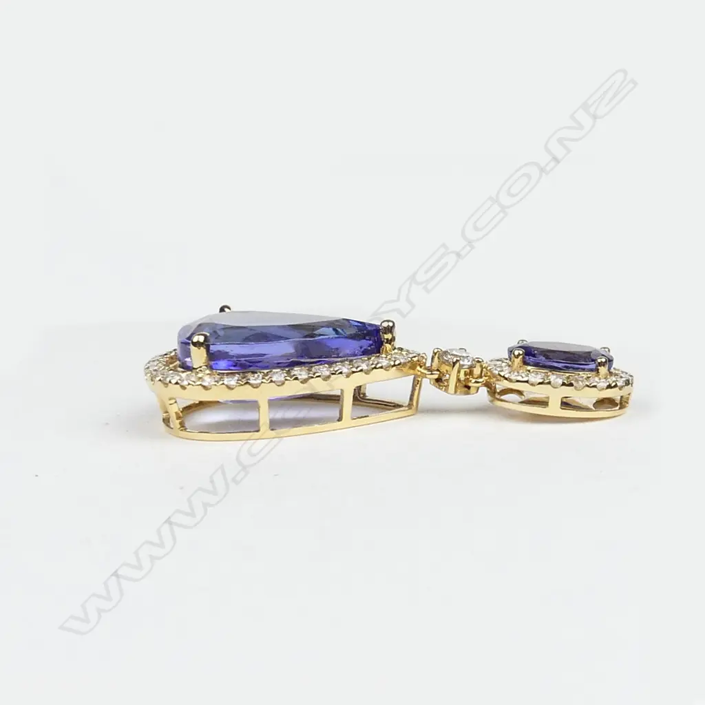 A pair of 14ct gold tanzanite and diamond earrings Image 1++