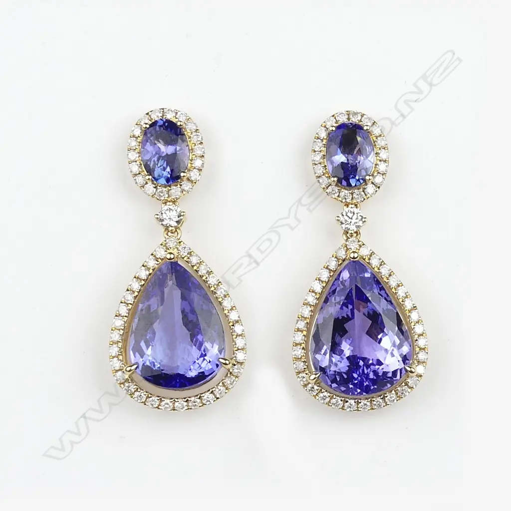 A pair of 14ct gold tanzanite and diamond earrings Image 1++