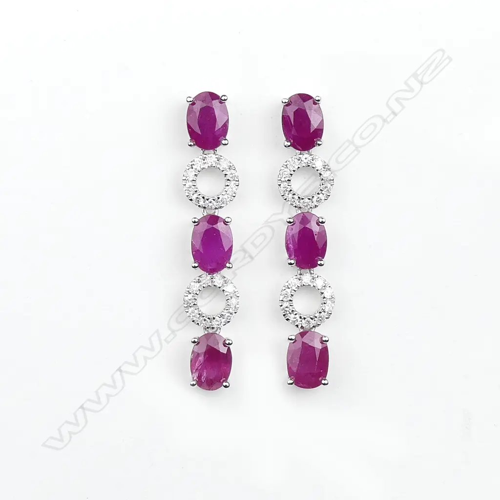 A pair of 14ct white gold ruby and diamond drop earrings Image 1++