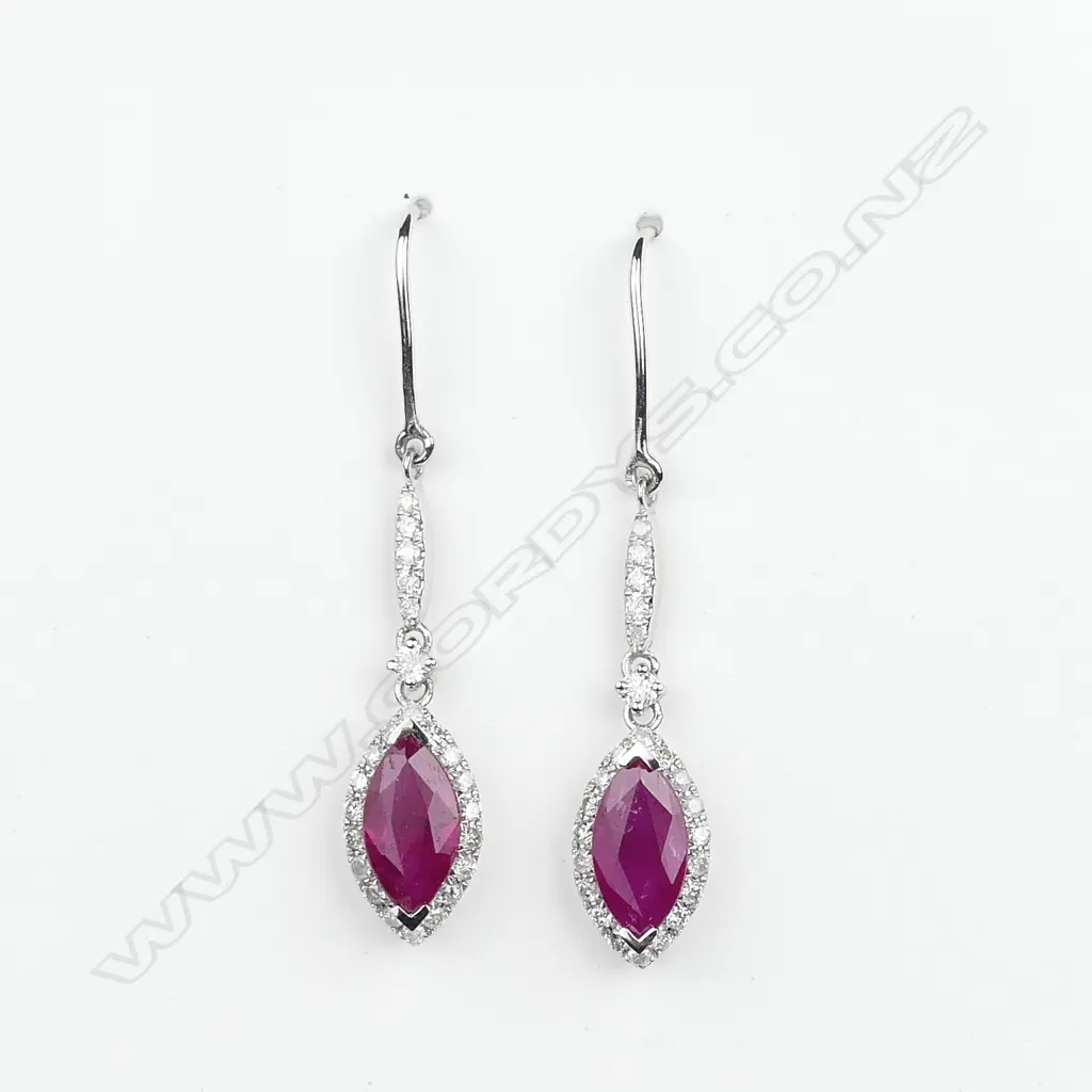 A pair of 14ct white gold ruby and diamond earrings Image 1++