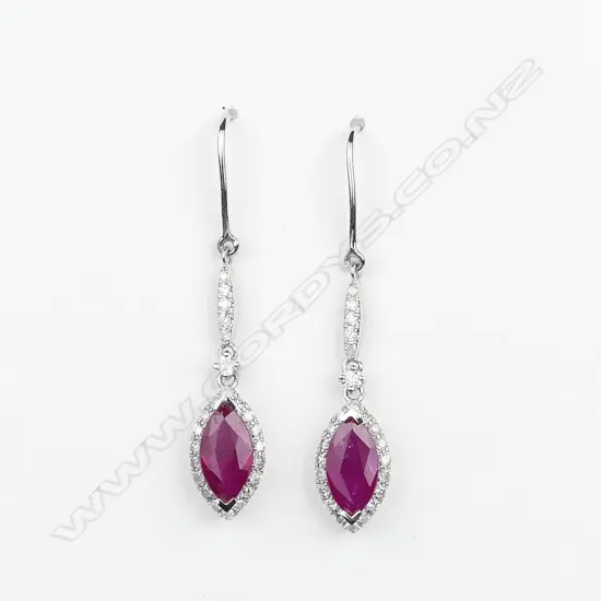 A pair of 14ct white gold ruby and diamond earrings