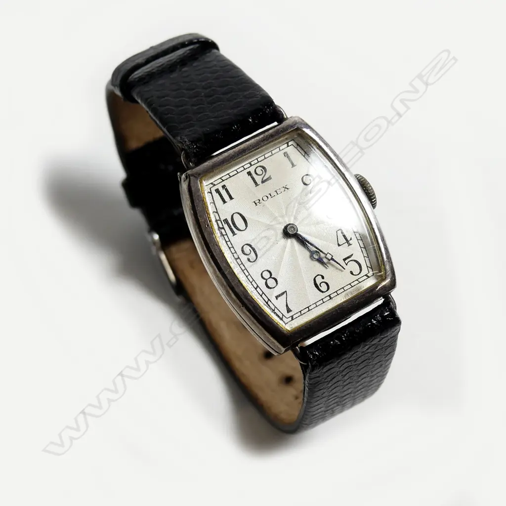 A vintage Rolex silver tonneau cased gent's wristwatch Image 1++
