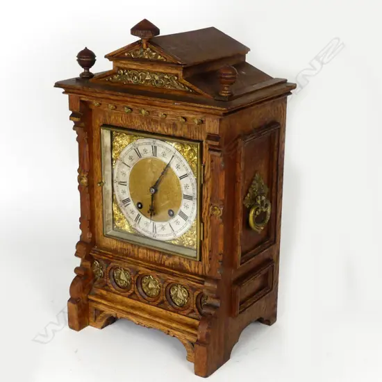 A Victorian oak bracket clock