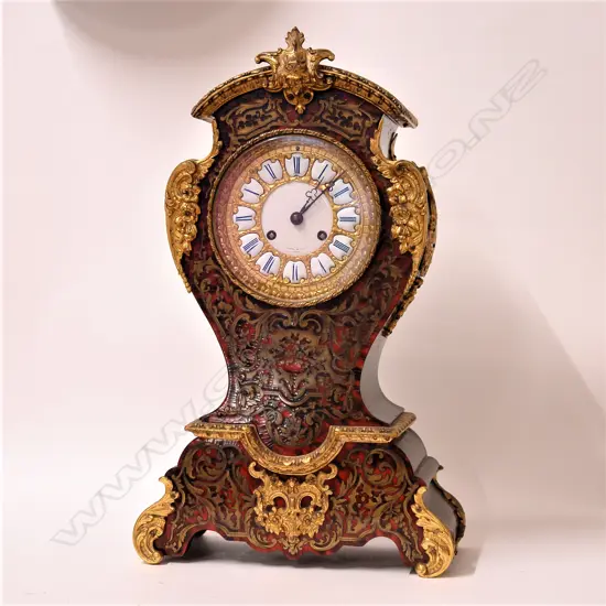 A good 19thC French Louis XV style boulle mantel clock