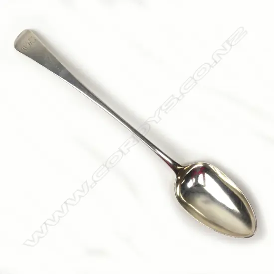 A rare Queen Anne Britannia standard silver basting spoon