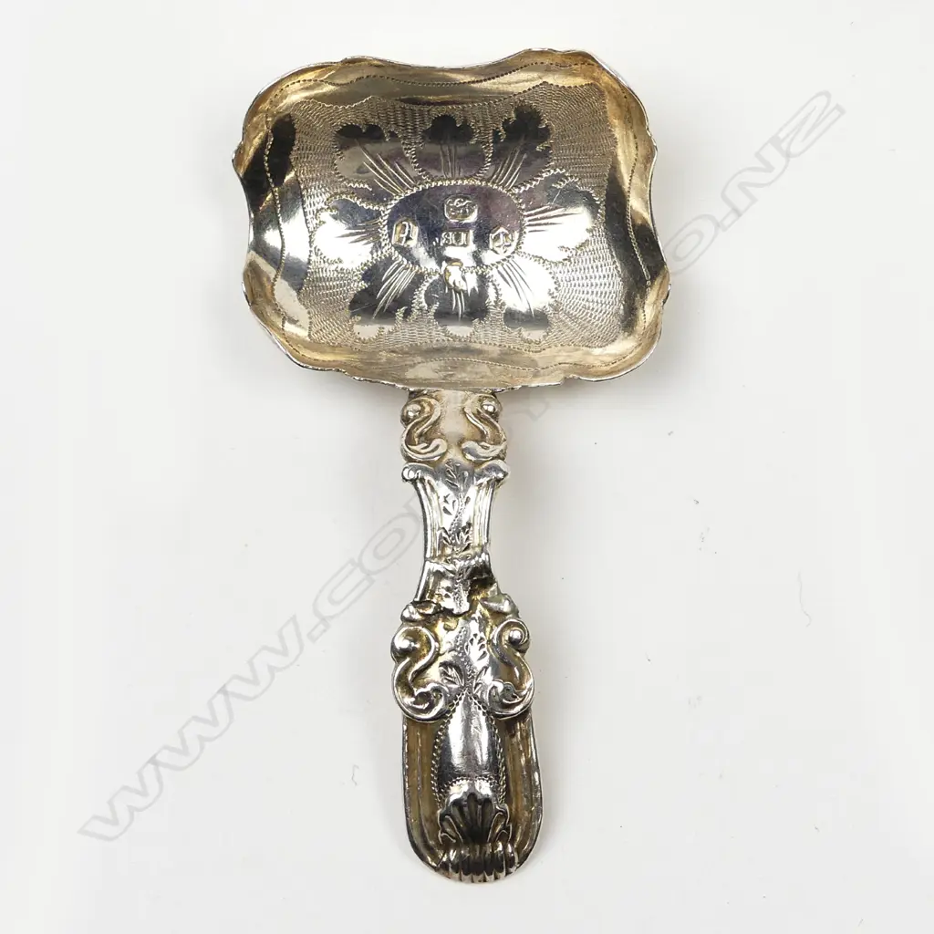 A George III fancy silver caddy spoon Image 1++