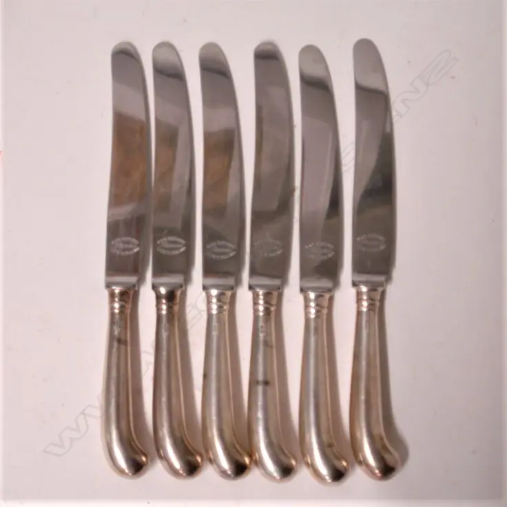 A set of six mid-20thC silver handled pistol grip knives Image 1++