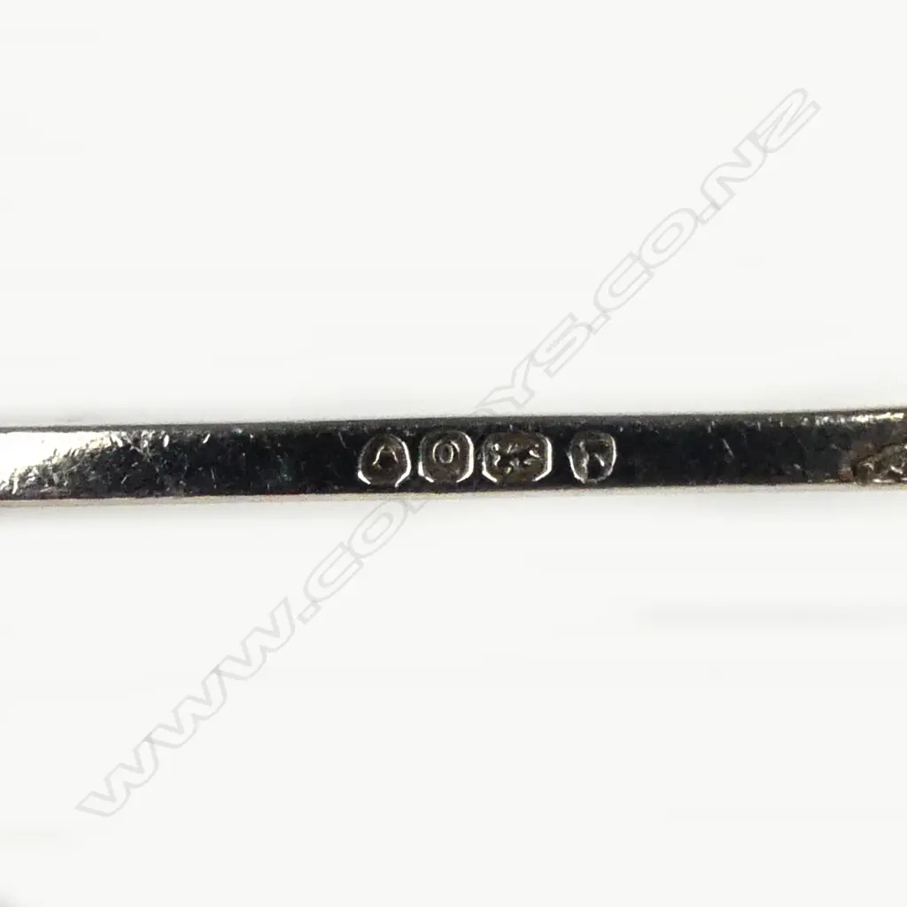 A pair of George IV silver knife rests Image 1++