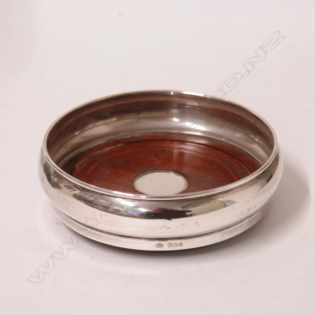 A modern silver and turned wood bottle coaster Image 1++