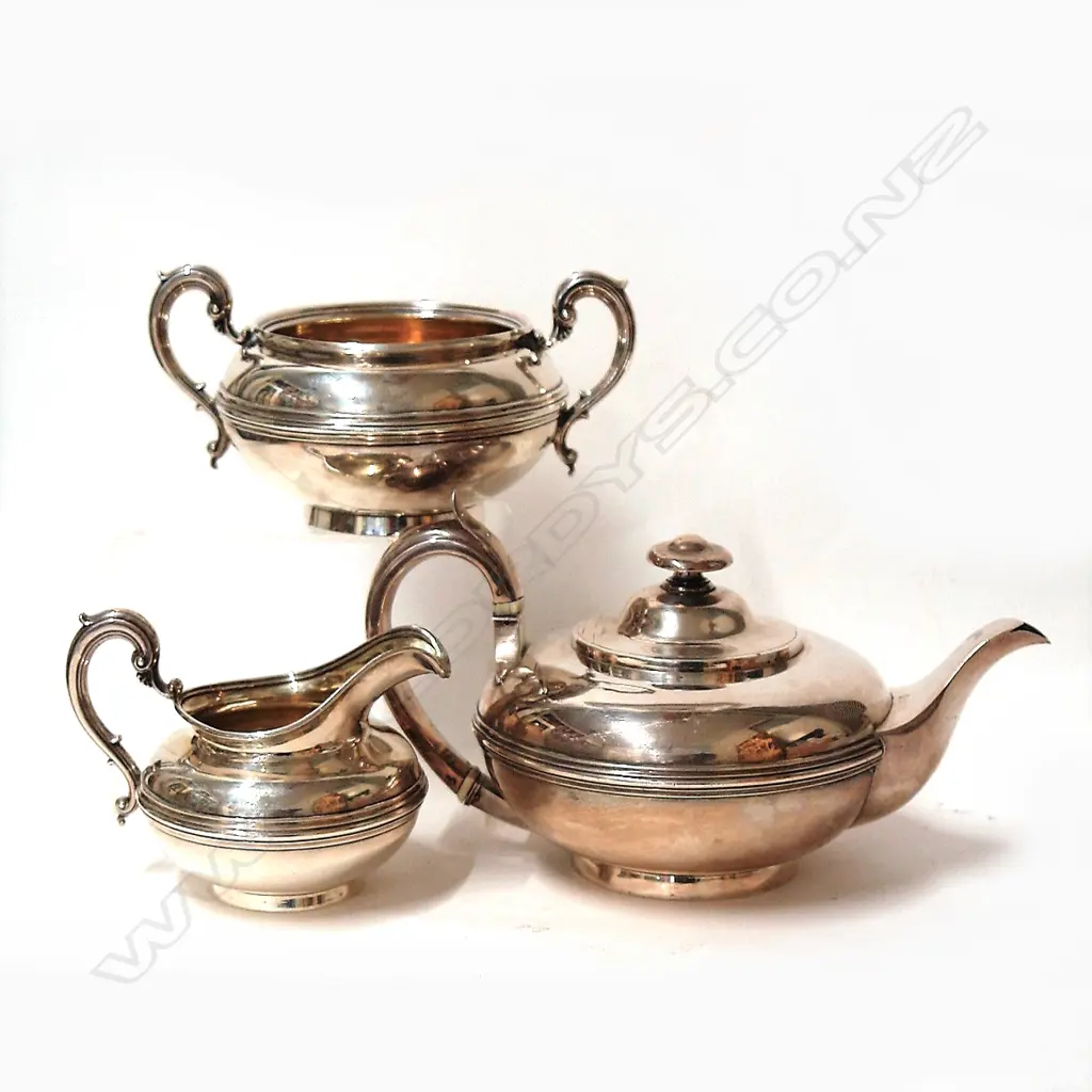 An early 19thC composite three piece heavy silver tea set Image 1++