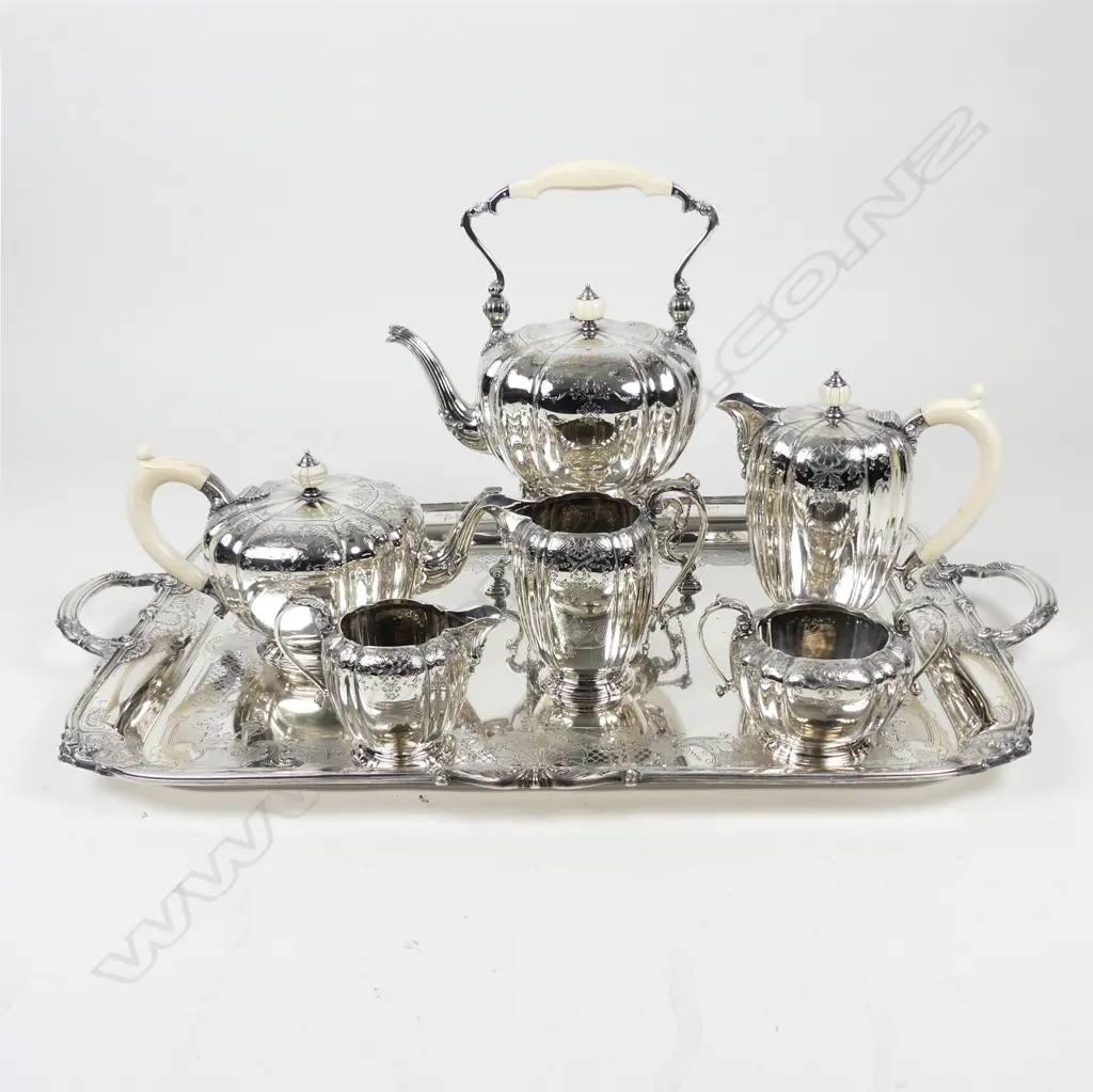 A sterling silver six piece tea set on tray Image 1++