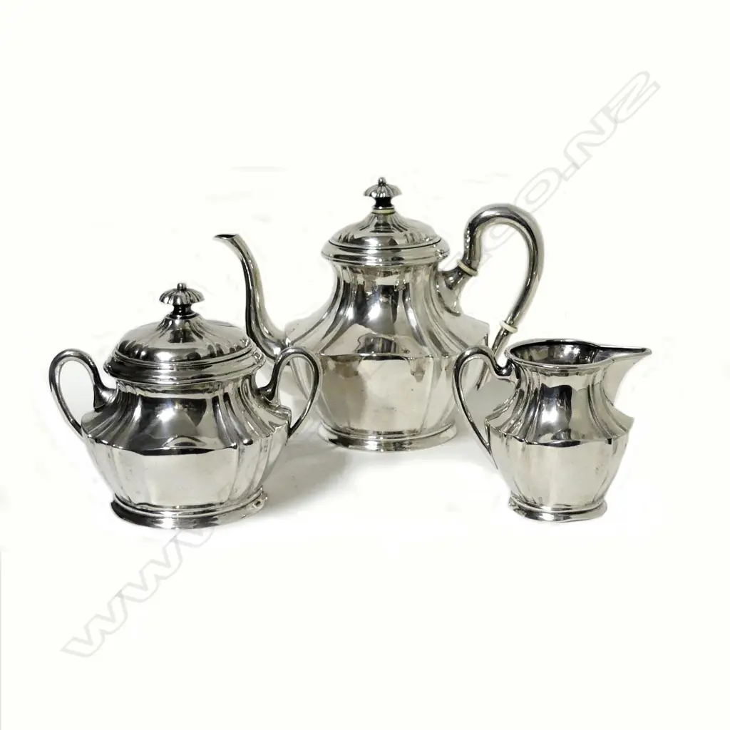 A Continental .830 silver three piece tea set Image 1++