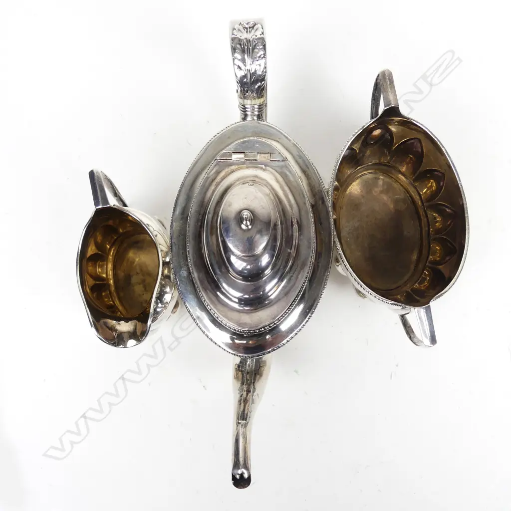 A George III silver three piece tea set Image 1++