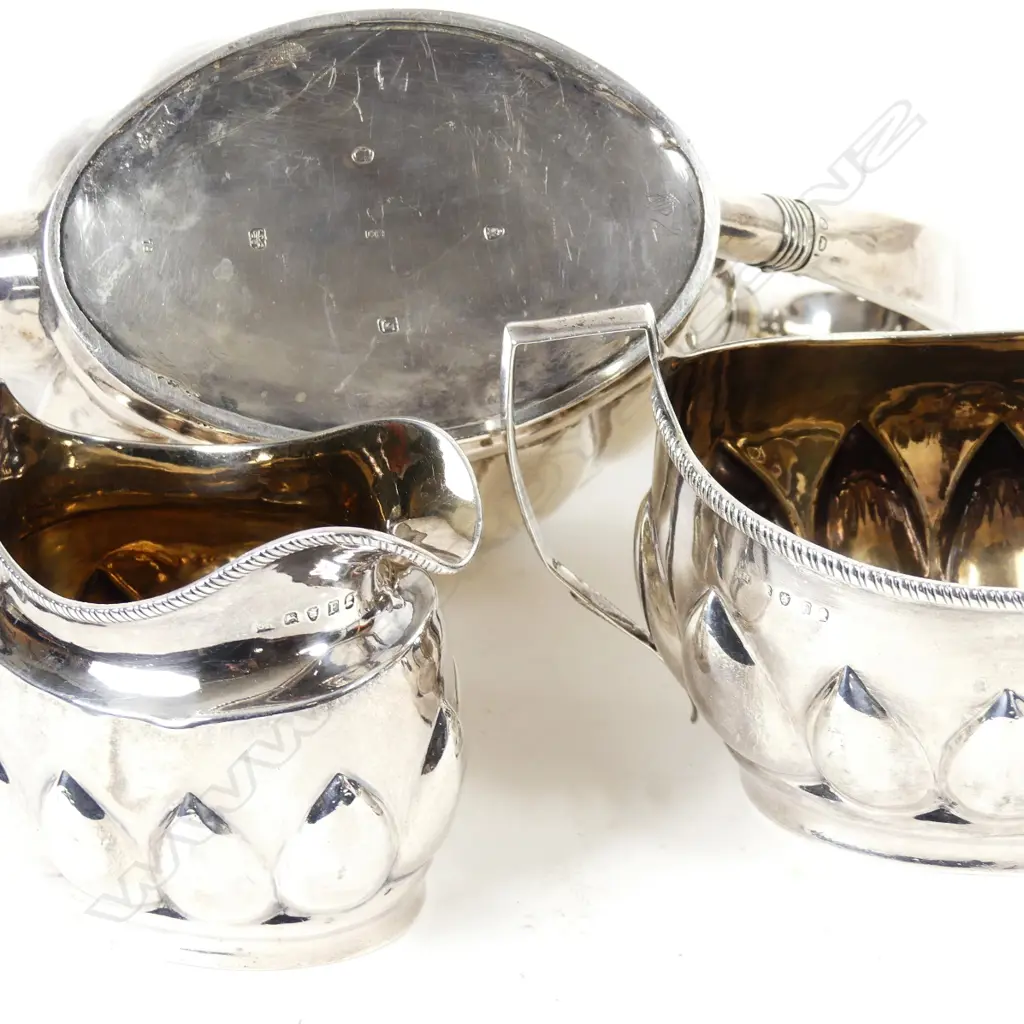 A George III silver three piece tea set Image 1++