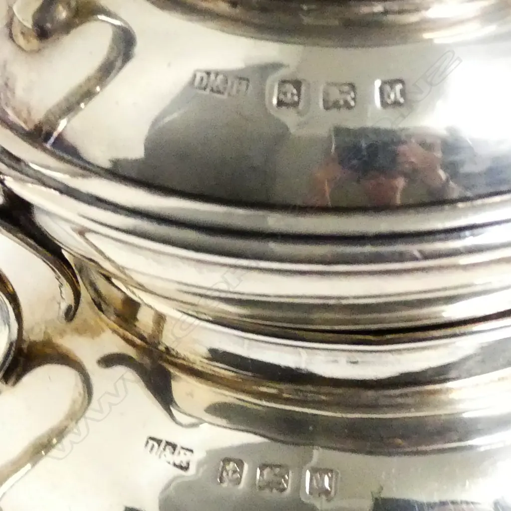 A 1930's silver three piece tea-set Image 1++