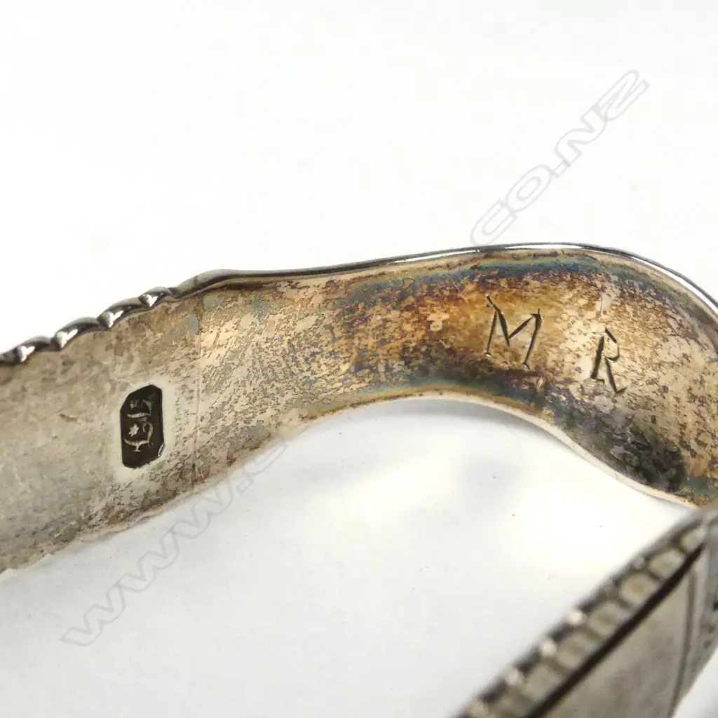 A pair of George III silver sugar tongs Image 1++