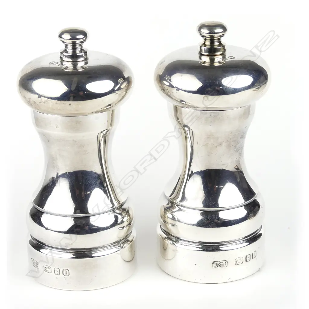 A pair of modern silver capstan pepper mills Image 1++