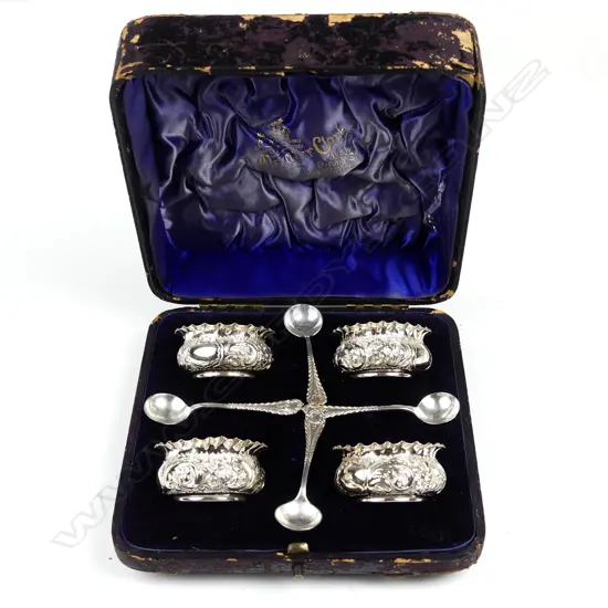 A cased set of four silver salts and spoons