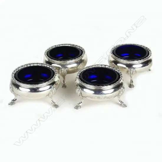 A set of four Victorian silver cauldron salts