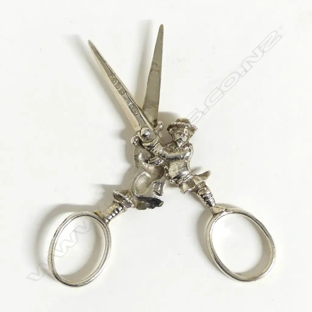 A pair of 19thC silver figured novelty scissors Image 1++