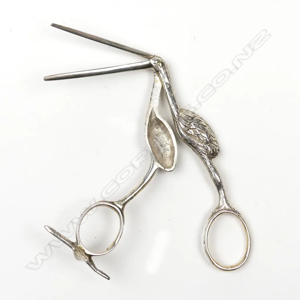 A pair of 19thC cast silver novelty stork figured scissors Image 1++