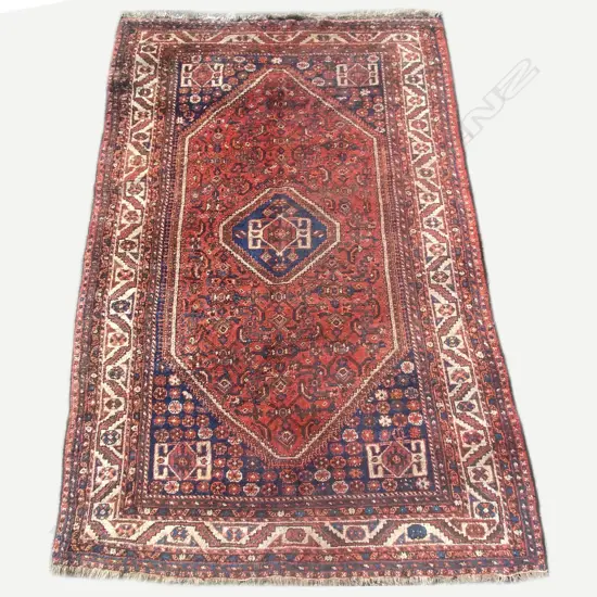An old Shiraz hand knotted carpet