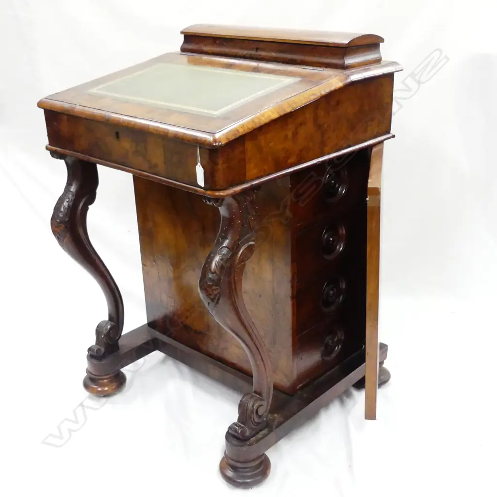 A Victorian walnut Davenport Image 1++