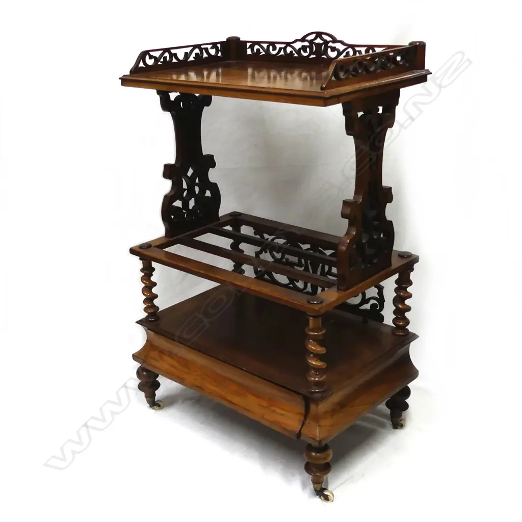 A Victorian walnut canterbury Image 1++