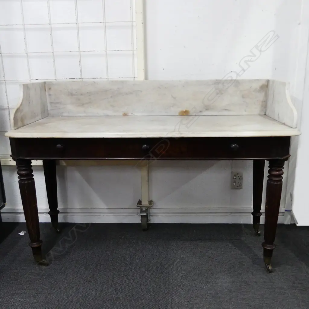 A Victorian marble top and mahogany washstand Image 1++