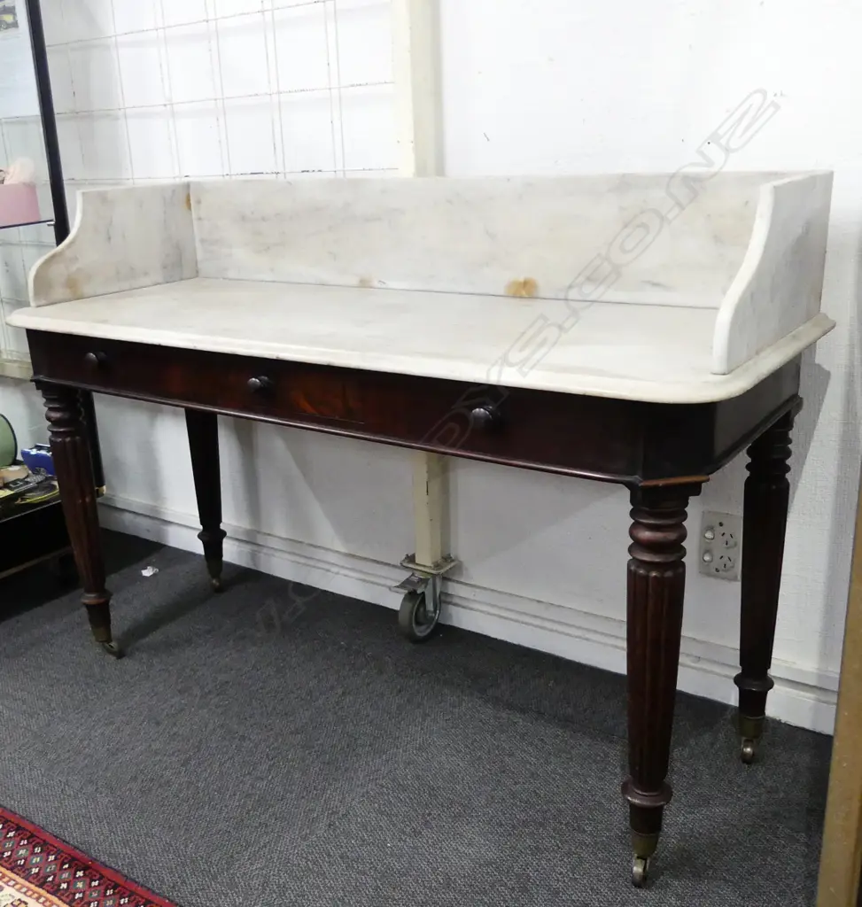 A Victorian marble top and mahogany washstand Image 1++